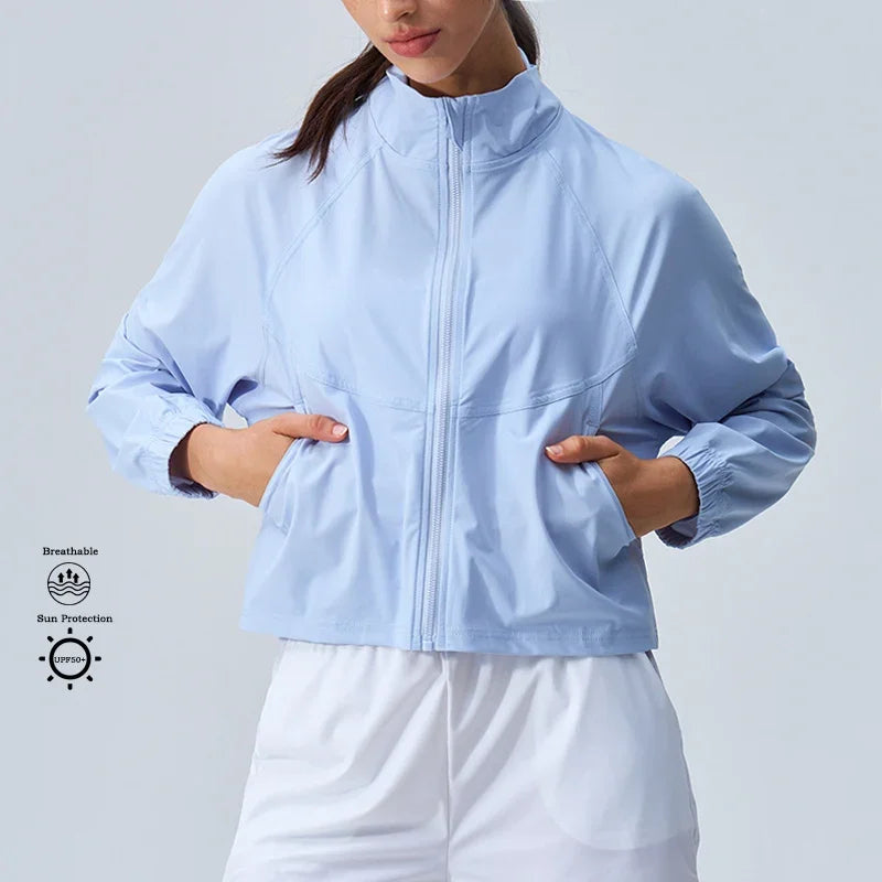 Kevyt ja lyhyt vetoketjullinen juoksutakki